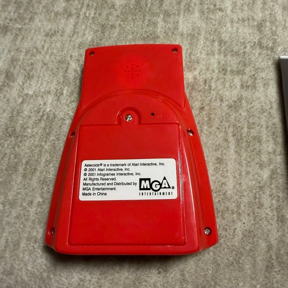 MGA Atari Asteroids Handheld Electronic Game 2004 Retro Tested‎ Working w Manual